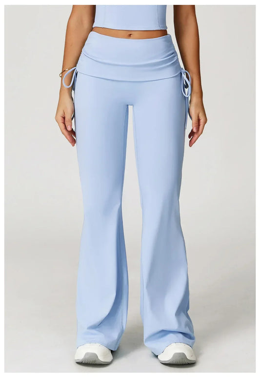 Legging évasé sport bleu de Beauté & Santé avec cordon de serrage, tissu stretch et coupe confortable pour le fitness.