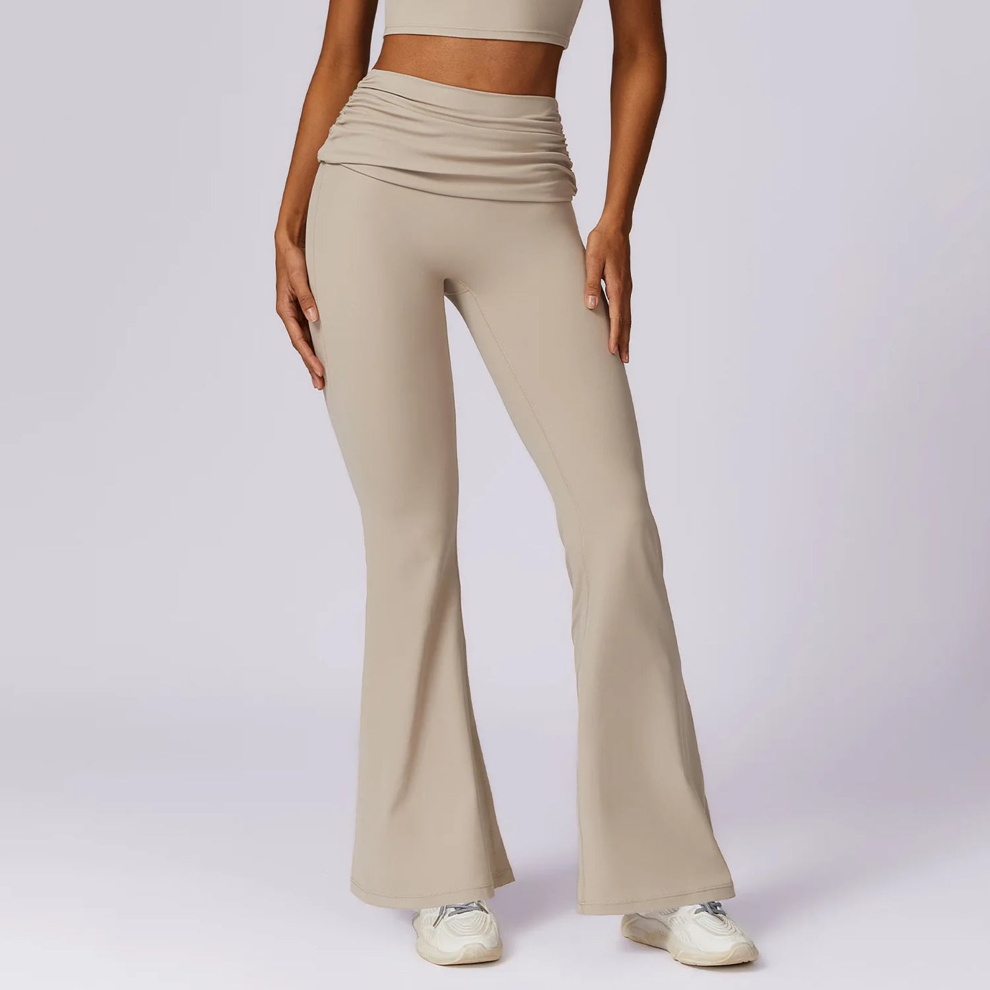 Leggings de yoga à taille haute Beauté & Santé, matière naturelle, design confortable et élégant pour la pratique sportive.