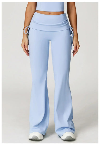 Legging évasé sport bleu de Beauté & Santé avec cordon de serrage, tissu stretch et coupe confortable pour le fitness.