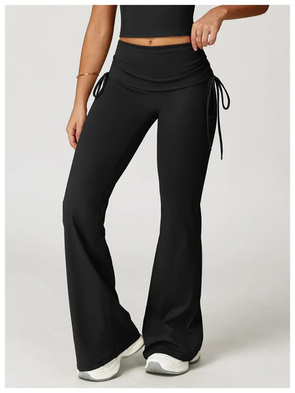Legging évasé de sport Beauté & Santé avec cordon de serrage noir, tissu extensible, adapté pour l'entraînement et le fitness.