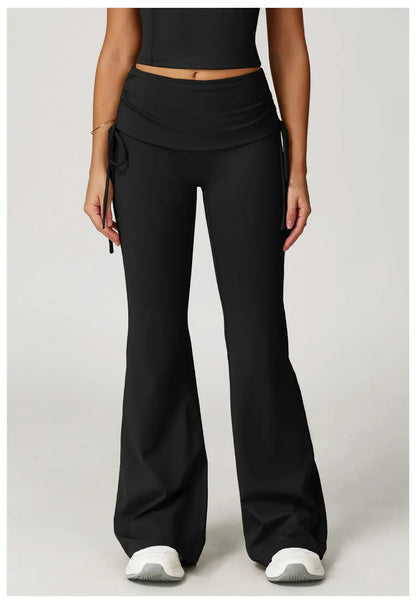 Legging évasé de sport Beauté & Santé avec cordon de serrage noir, vu de face, tissu extensible et confortable pour entraînement.