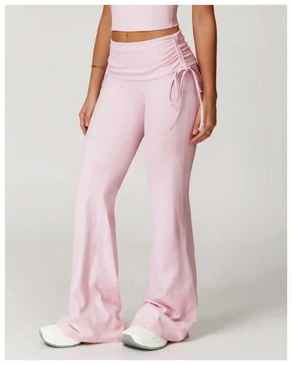 Legging évasé de sport rose avec cordon de serrage de la marque Beauté & Santé, tissu extensible et confortable pour l'exercice.