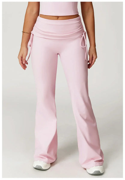 Legging évasé de sport Beauté & Santé avec cordon de serrage rose, tissu extensible et confortable pour l'entraînement.