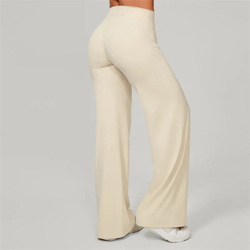 Legging de Pilates Beauté & Santé, pantalon évasé avec jambes larges, tissu extensible pour confort et liberté de mouvement.