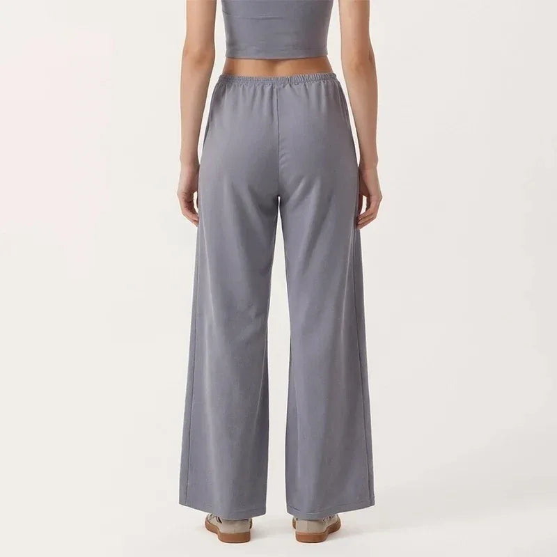 Legging de yoga Beauté & Santé avec jambe large et cordon de serrage, tissu extensible pour un confort optimal.