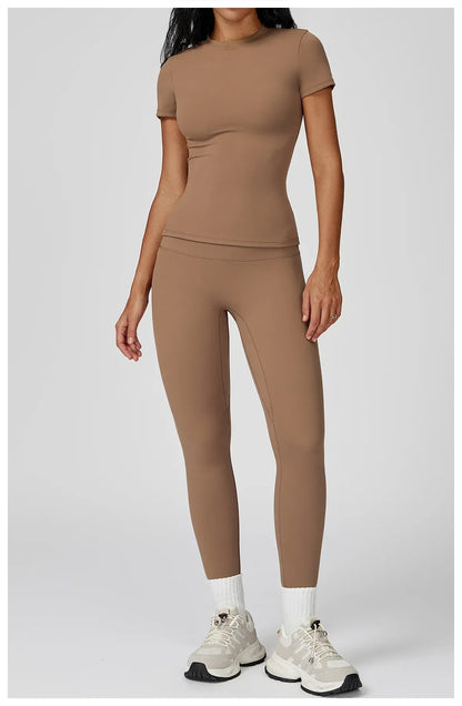 Legging et haut de yoga à manches longues de l'ensemble Beauté & Santé, tissu extensible et confortable, pour pratique sportive.