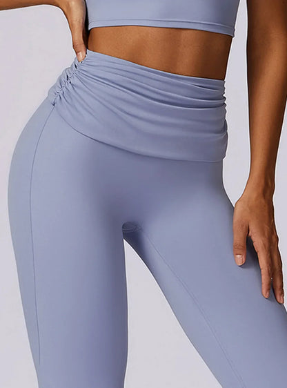 Legging de yoga taille haute Beauté & Santé, tissu naturel, ajusté, confortable, pour pratique sportive et détente.