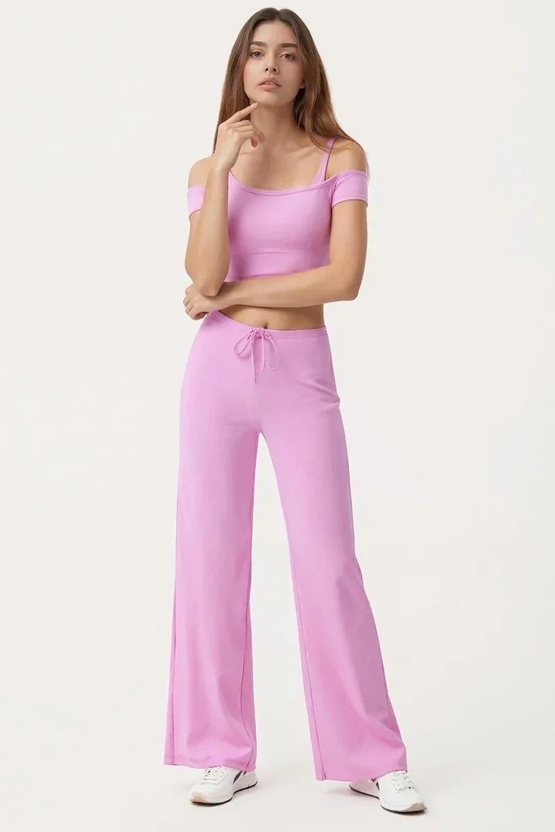Legging de yoga Beauté & Santé avec jambe large et cordon de serrage, tissu extensible pour confort et style sportif.
