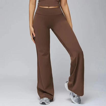 Leggings de yoga évasés taille haute de Beauté & Santé, gainants, en tissu noir avec finition élégante visible sur l'image.
