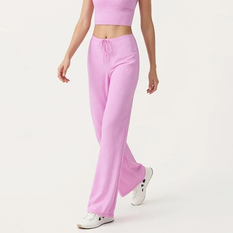 Legging de yoga Beauté & Santé avec large jambe et cordon de serrage, tissu extensible pour confort et style.