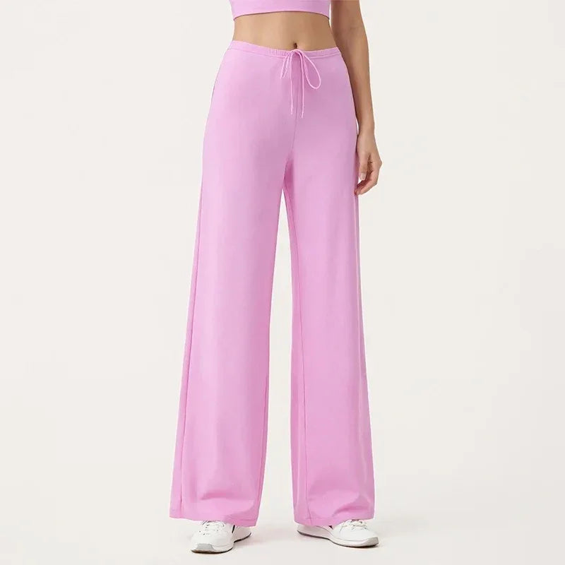 Leggings de yoga Beauté & Santé avec jambe large et cordon de serrage, tissu extensible pour entraînement confortable.