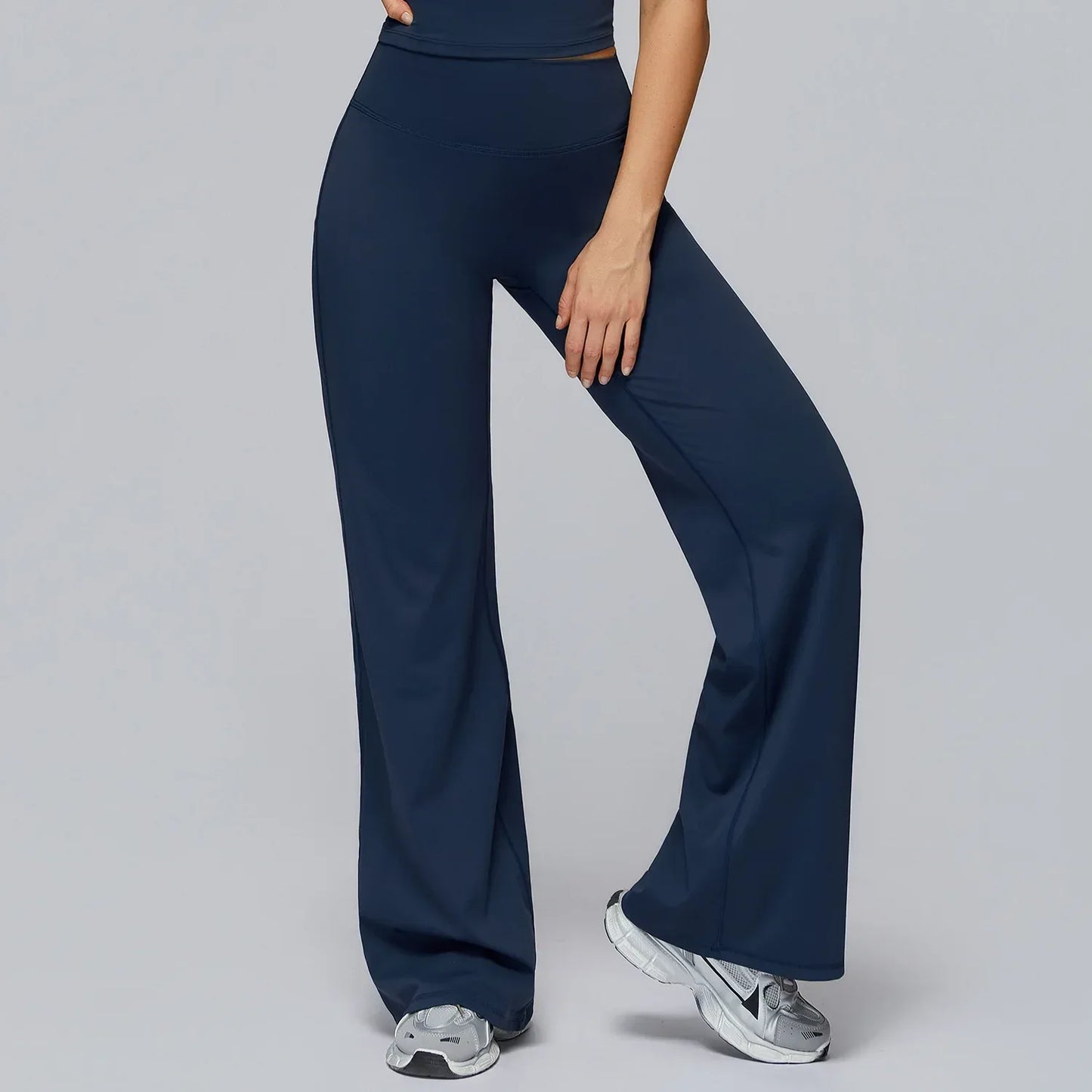 Legging de yoga évasé taille haute gainant de la marque Beauté & Santé, tissu extensible et confortable pour l'exercice et le bien-être.