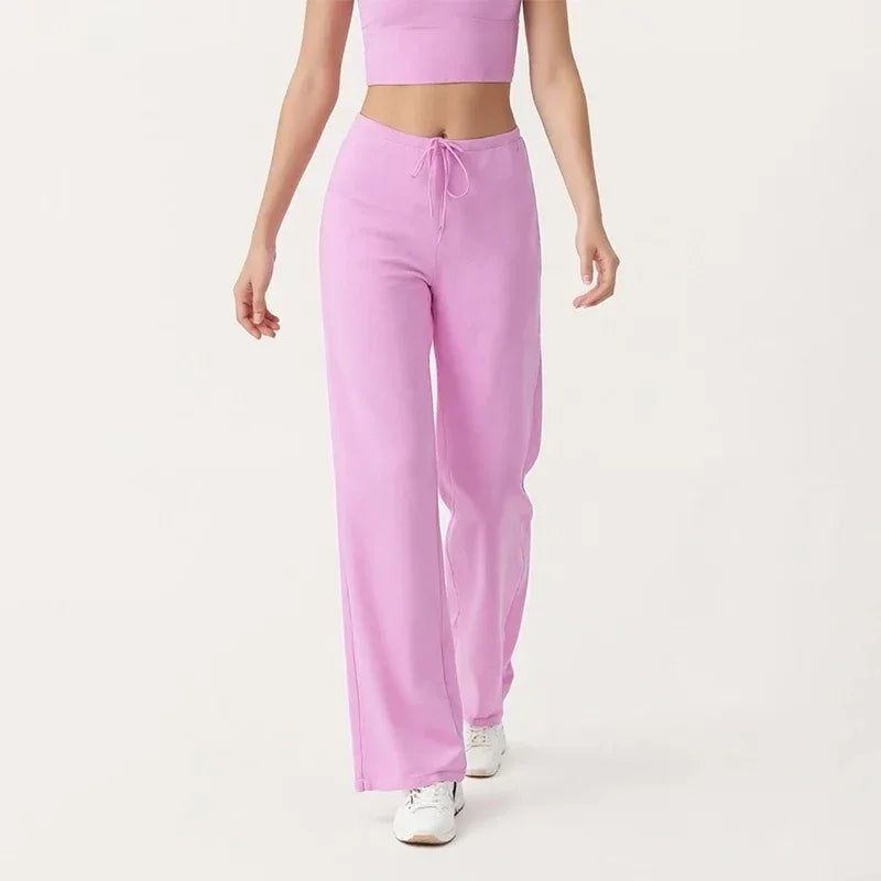 Leggings de yoga Beauté & Santé avec jambe large et cordon de serrage, tissu extensible pour confort et style.