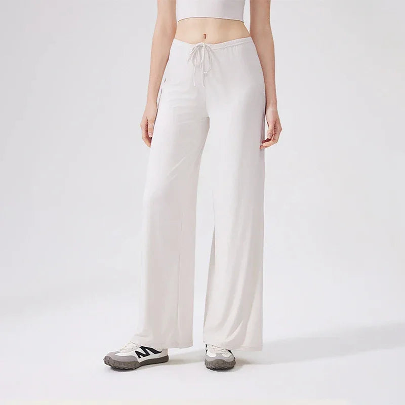 Leggings de yoga Beauté & Santé avec jambe large et cordon de serrage, en tissu extensible pour un confort optimal.