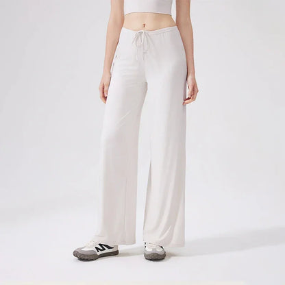 Leggings de yoga Beauté & Santé avec jambe large et cordon de serrage, en tissu extensible pour un confort optimal.