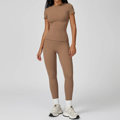 Leggings de yoga deux pièces à manches longues de la marque Beauté & Santé, tissu extensible et confortable pour la pratique.