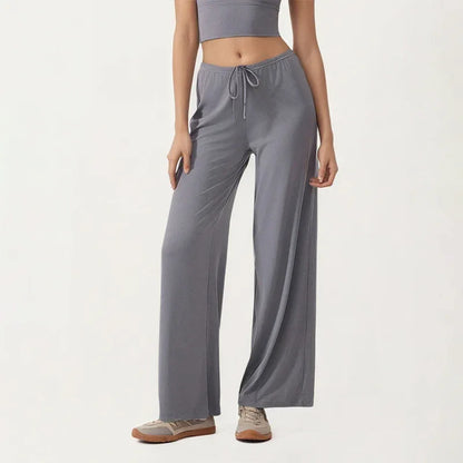 Leggings de yoga Beauté & Santé avec jambe large et cordon de serrage, tissu extensible pour confort et style.