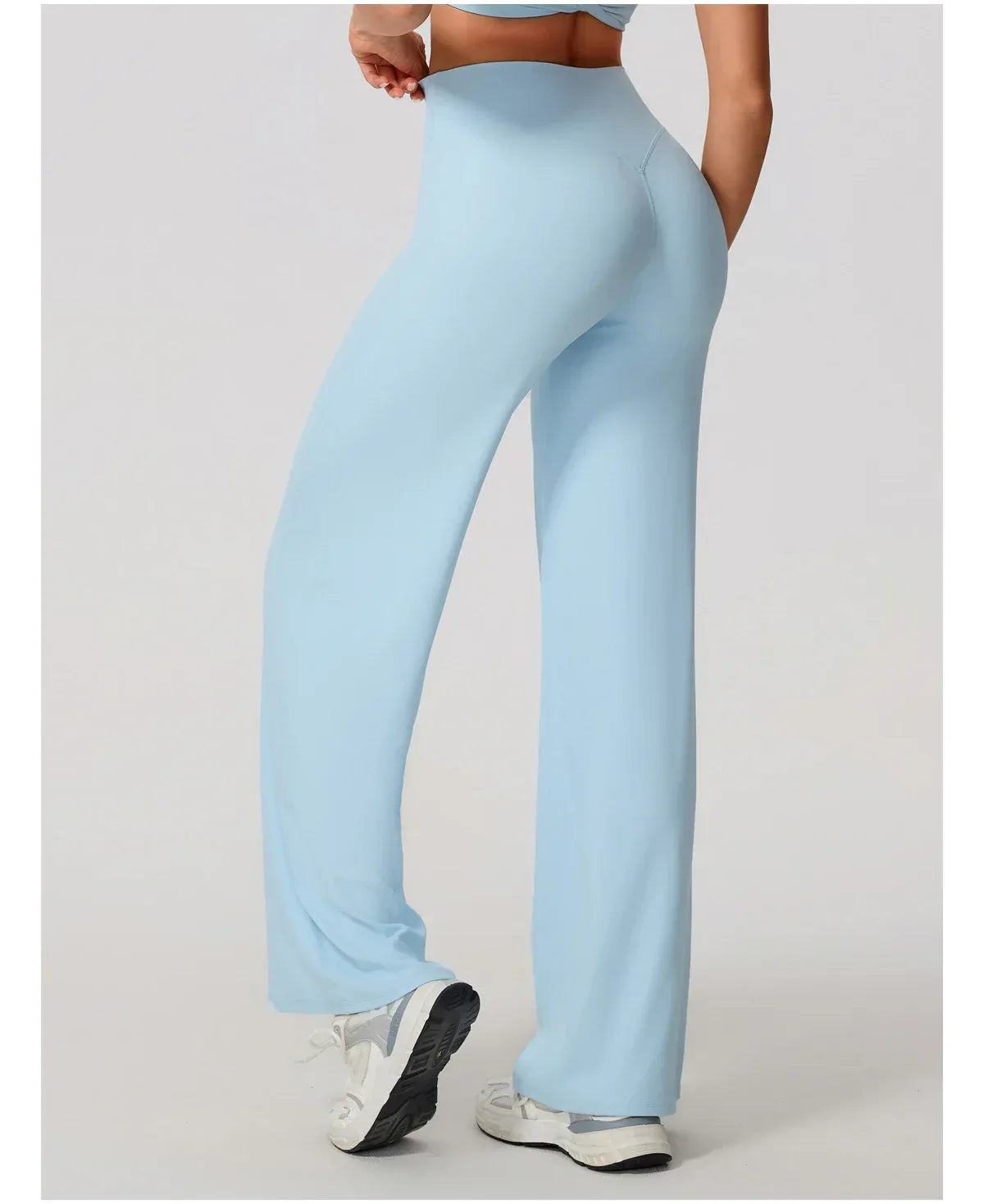 Legging de yoga sport décontracté Beauté & Santé, coupe évasée, tissu confortable, porté en mouvement ou à la maison.