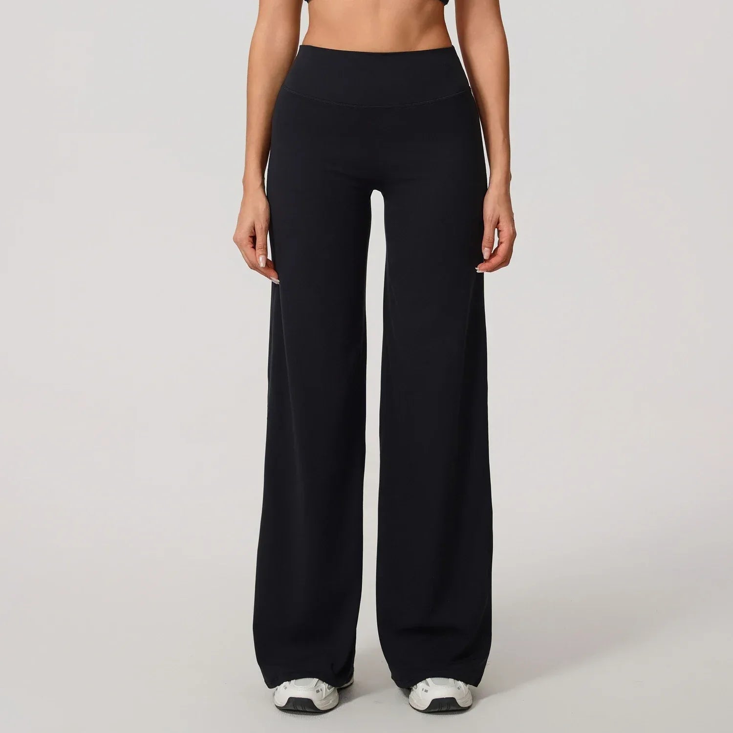 Legging de yoga décontracté de Beauté & Santé avec coupe évasée, tissu confortable et style sportif pour la pratique ou la détente.