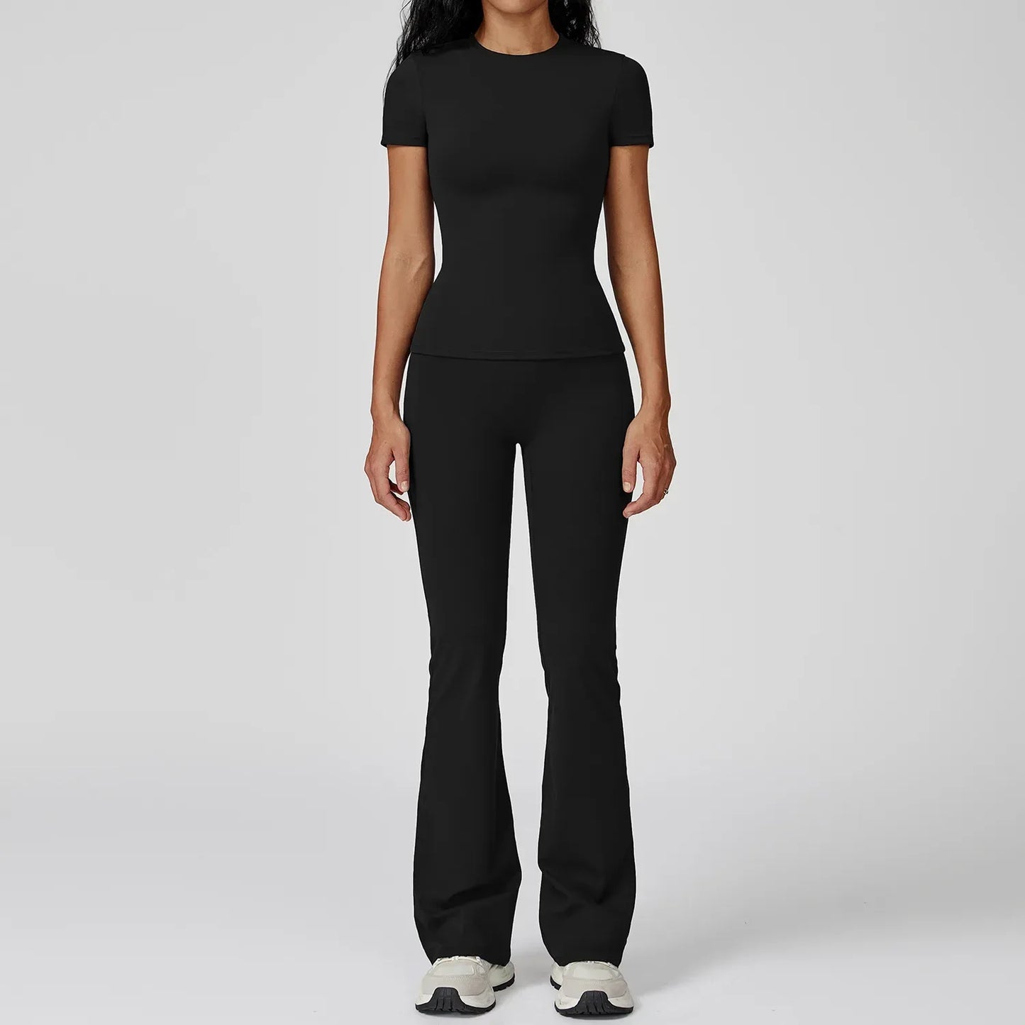 Leggings de yoga à manches longues Beauté & Santé, ensemble deux pièces, tissu extensible et confortable pour la pratique sportive.