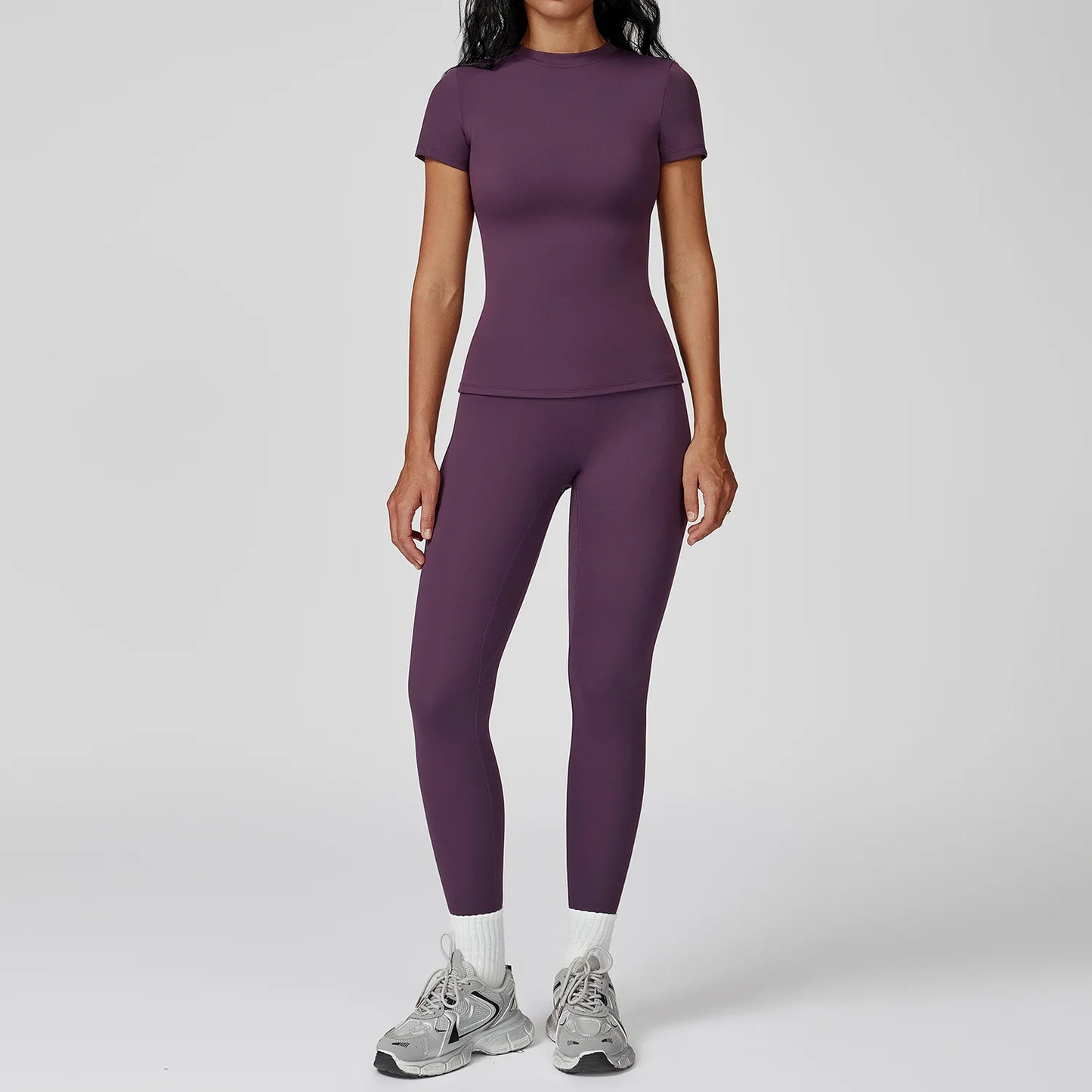 Leggings de yoga 2 pièces à manches longues de la marque Beauté & Santé, tissu extensible pour confort et flexibilité.