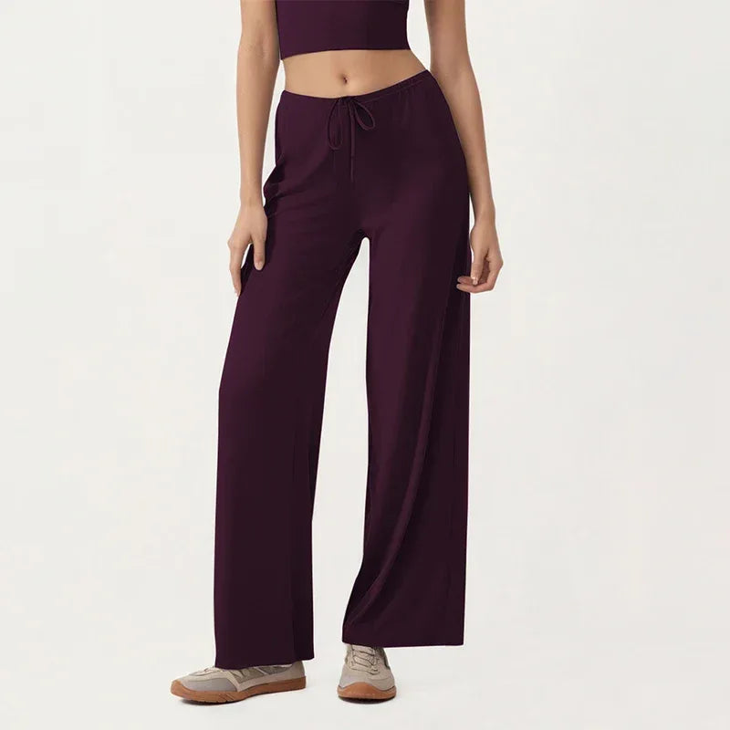 Leggings de yoga taille large avec cordon de serrage de la marque Beauté & Santé, tissu extensible et confortable pour la pratique sportive.